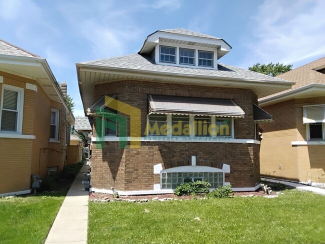 Building Photo - Spacious 5-Bedroom Brick Bungalow with Updated Interior