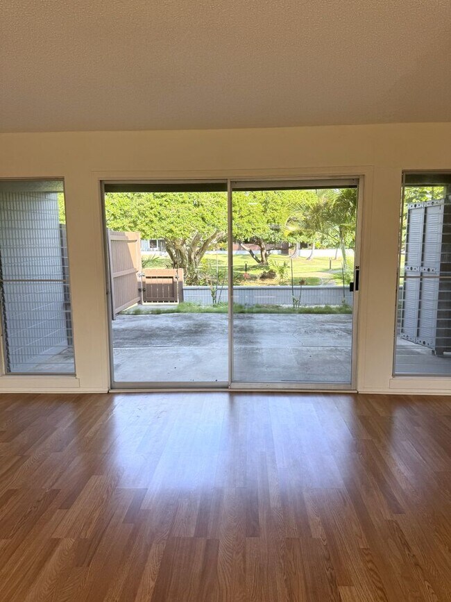 Photo - Koko Isle Circle - 3 bedroom, 2 full bath, 1 half bath with two car carport