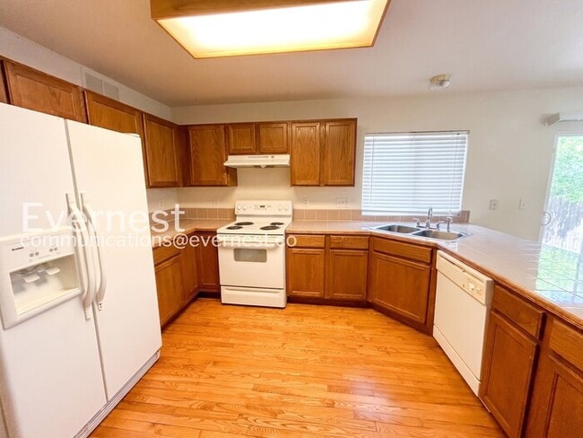 Photo - 3 Bed, 2.5 Bath Home with Fenced Yard & Garage / Available Soon!