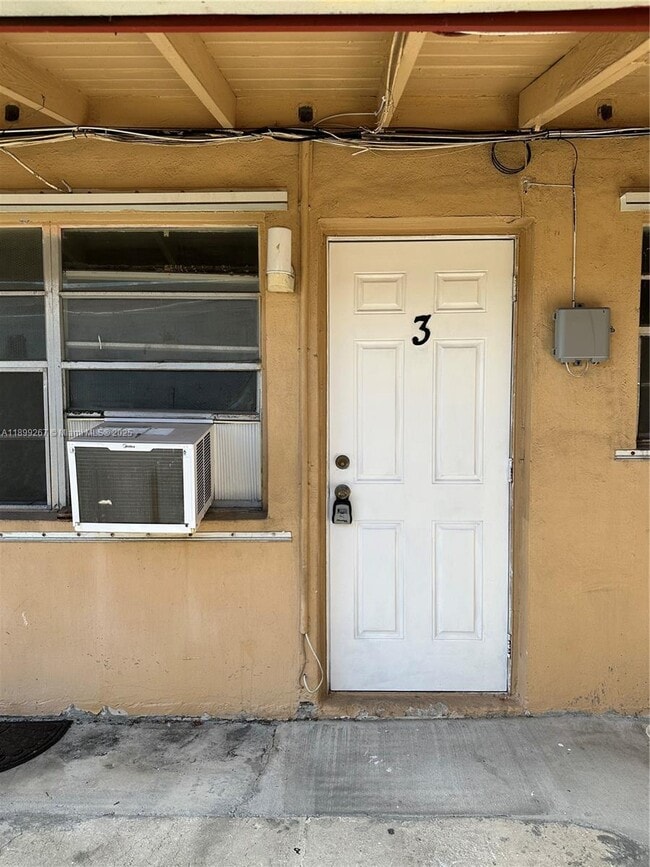 Building Photo - 5797 Flagler St Unit 3