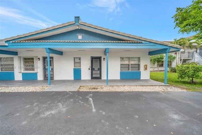 Building Photo - 11640 NW 39th St Unit 8