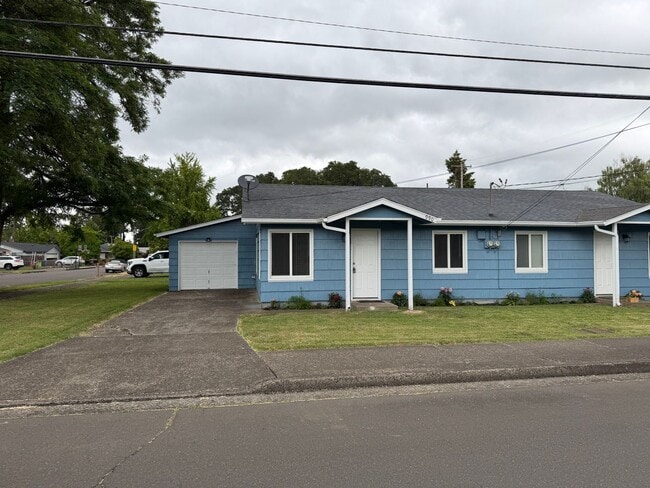 Building Photo - Updated two-bedroom one bathroom duplex with a fenced yard!