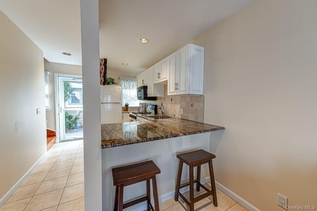 Photo - 49 Canoe Place Rd Unit 212