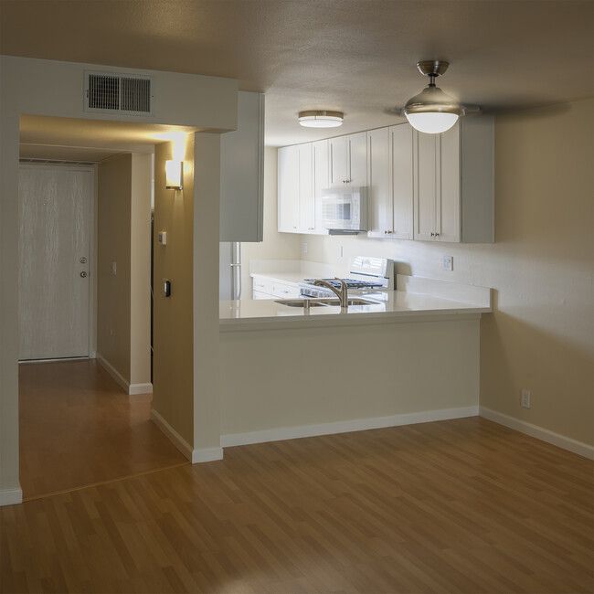 Kitchen and front entrance. - 426 Orange Blossom Apartment