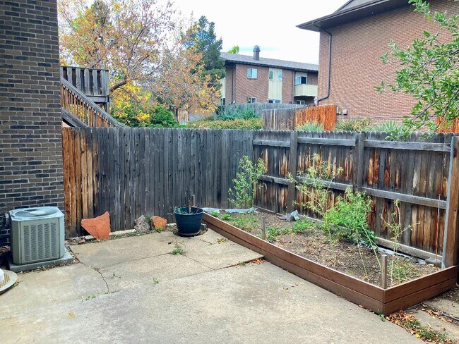 private fenced patio - 1403 Bradley Dr Townhome