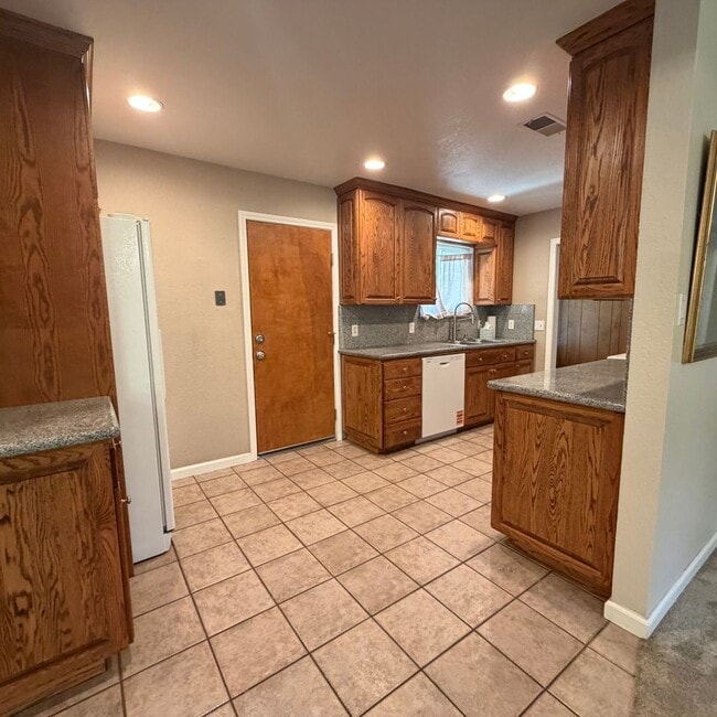 Photo - Adorable house with large deck, yard and RV access