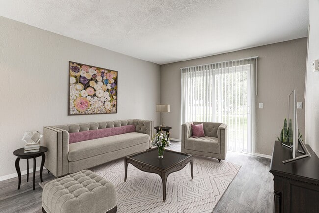 Upgraded Living Room - Available in select units - Autumn Woods Apartments