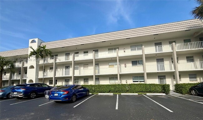 Building Photo - 8590 Sunrise Lakes Blvd Unit 309