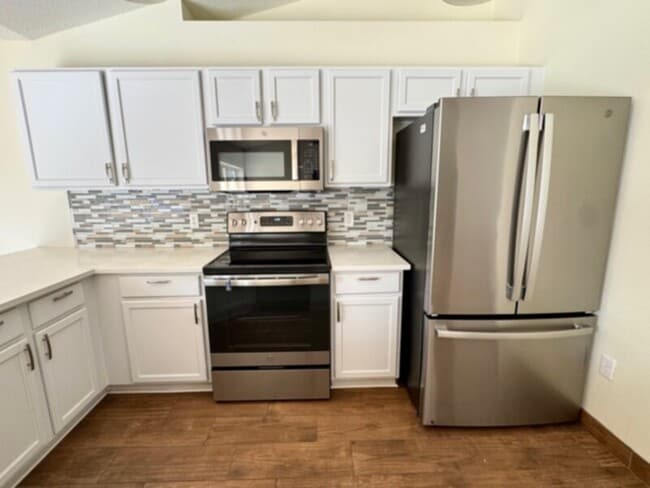 Photo - Stunning 4 Bedroom, 2 Bath Home with HUGE Patio &amp; Backyard