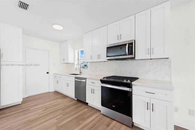 Photo - 9411 Jamaica Dr