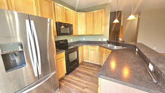 Photo - 2 bed 1.5 bath Apple Valley townhome available 6/15/2026 – Perfectly Efficient & Cozy!"