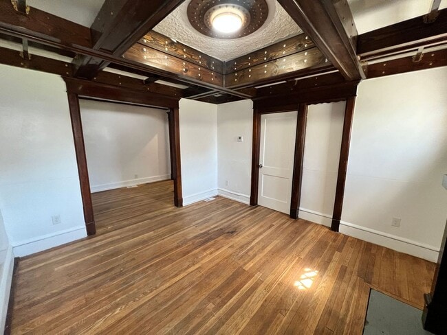 Photo - Stylish 2-Bedroom Unit Featuring Decorative Fireplace