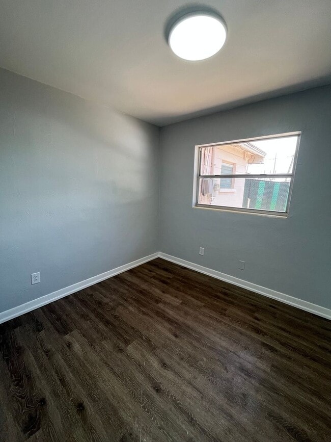 Photo - Great Location for This 4BR/1BA Lakeland Home! Large Screened In Porch, Fenced Backyard