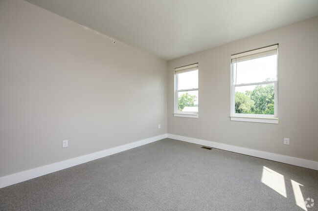 2BR, 2.5BA - 1,561SF - Primary Bedroom - The Assumption on Blaine Apartments
