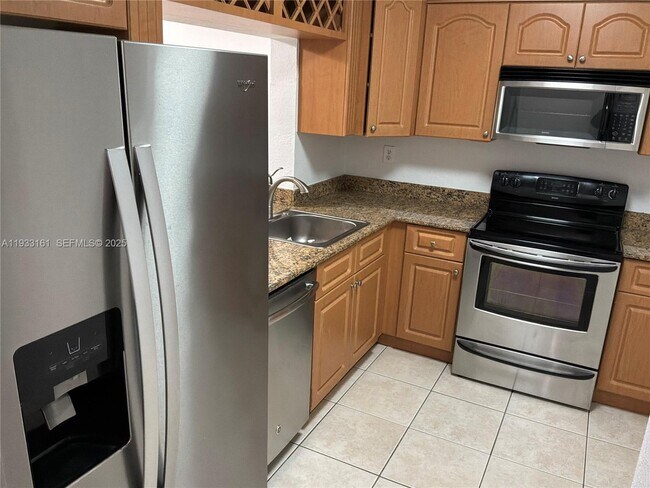 Building Photo - 6051 10th Ave N Unit 233