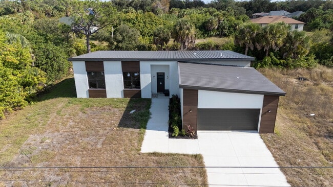 Photo - Brand New Construction 3/2 Canal Front Home for Rent in North Port