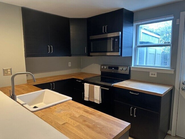 Photo - One level living in a spacious upgraded condo