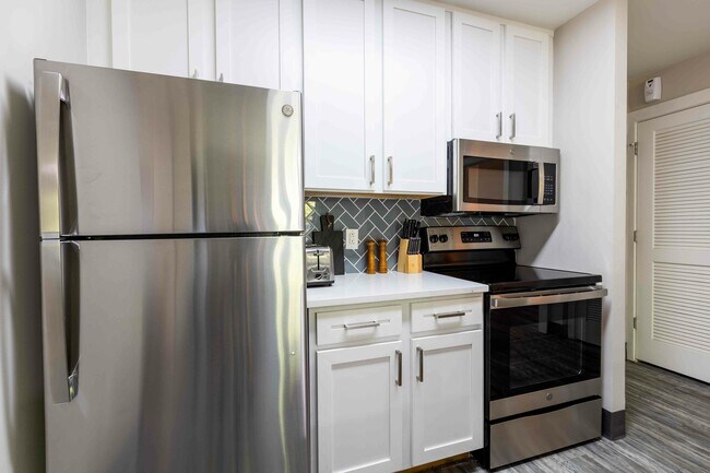 Valentine-Commons-Off-Campus-Apartments-Just-Steps-From-NC-State-University-Platium-Floor-Plans-Stainless-Steel-Kitchen-Appliances
