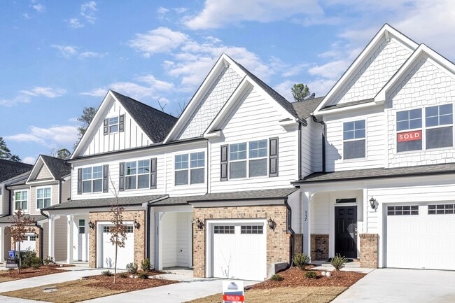 Photo - Updated Townhome with 1 Car Garage - close to Southpoint!