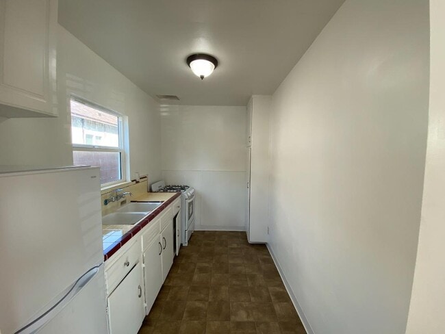 KITCHEN FROM DINING ROOM