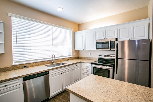 Gourmet Kitchens with Stainless Steel Microwave & Dishwasher