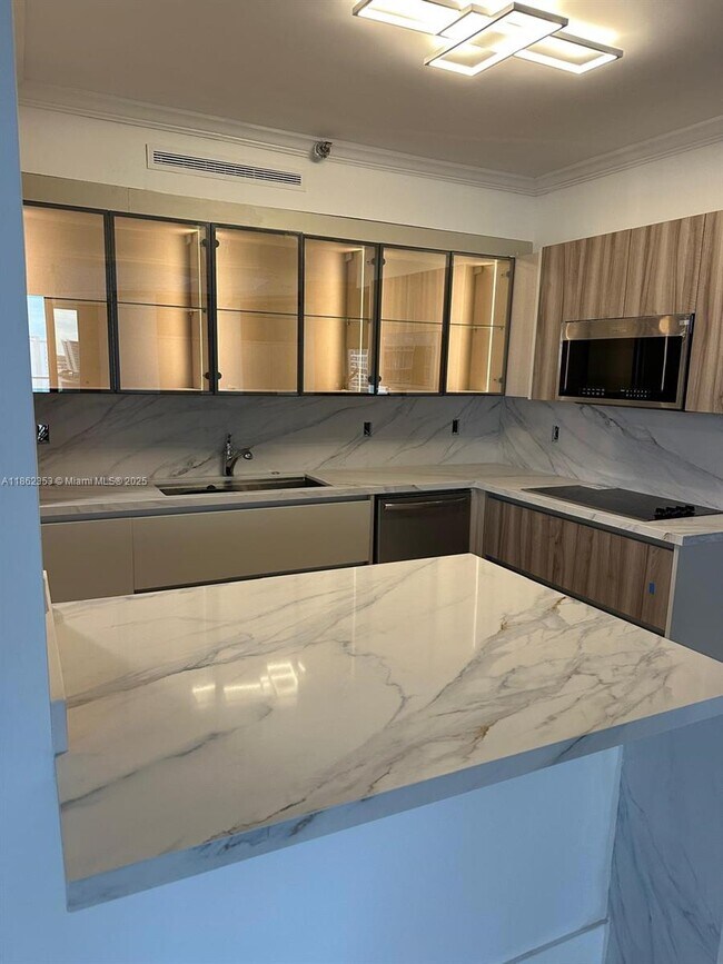 Photo - 19500 Turnberry Way Unit 12E