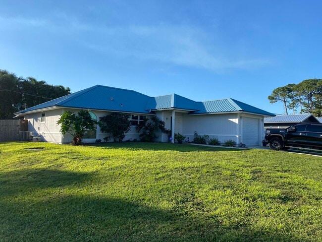 Building Photo - 3196 SW Areca Dr Rental