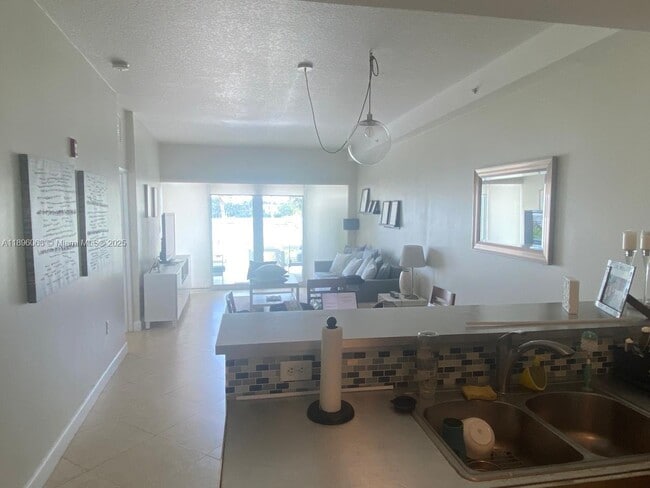 Building Photo - 6580 Indian Creek Dr Unit 206
