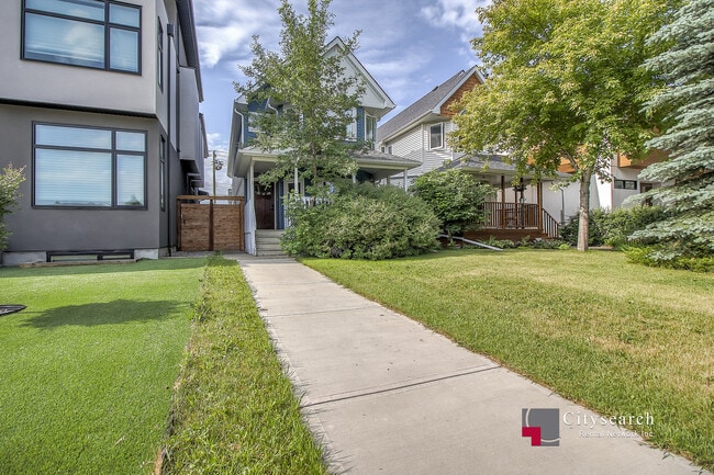 Building Photo - 127-38a 38a Ave SW