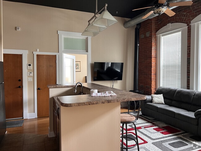 Kitchen/Living Room to Bedroom 1 - 124 N Neil St Rental