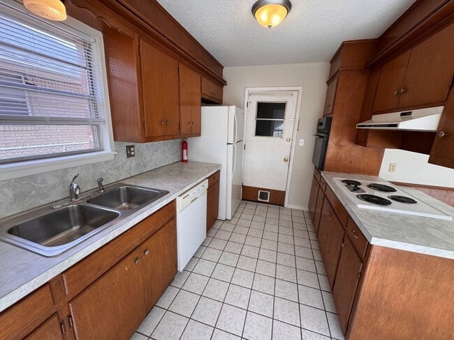 Photo - Huge fenced yard, charming 3-bedroom Norman home ready for move in!