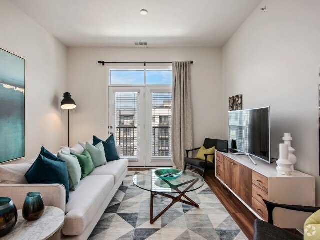 Living Room w/ Walk-out Balcony - Avenue 80 Rental