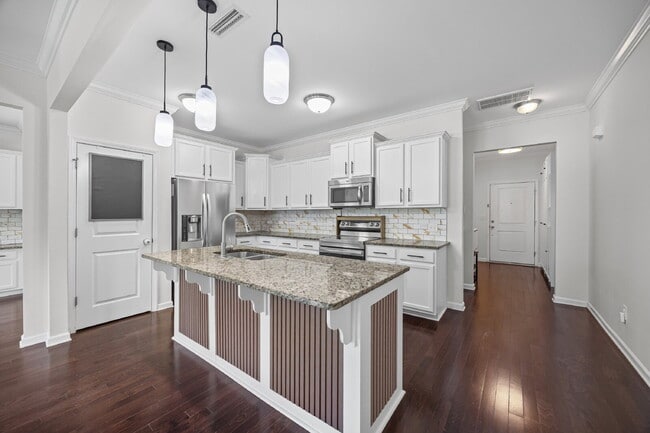 Photo - "Spacious 3-Bedroom Townhome with Fireplace, Pergola & Community Pool on Summerlake Drive!"