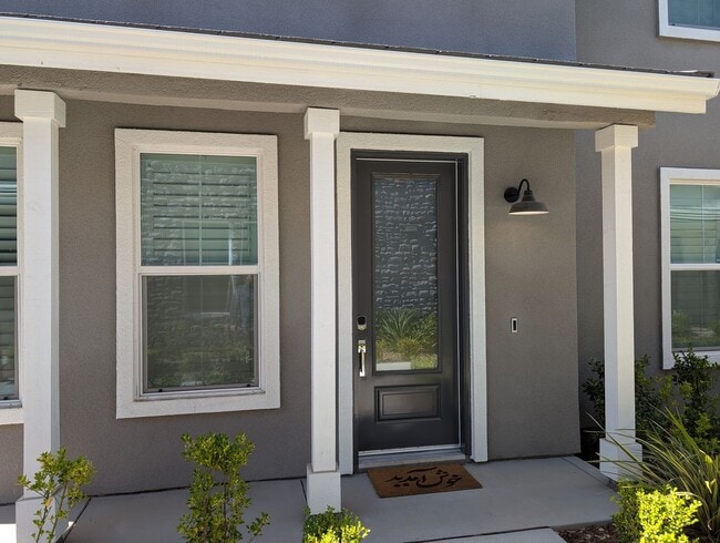 Photo - Modern home in a modern community featuring upgraded amities, solar, community pool + Close to Co...