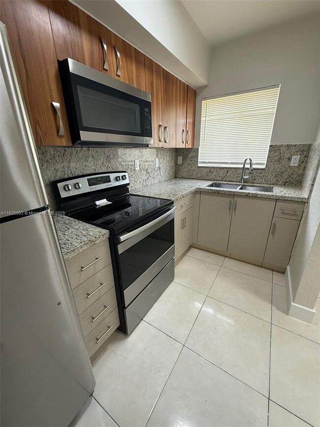 Photo - 441 NW 83rd St Townhome