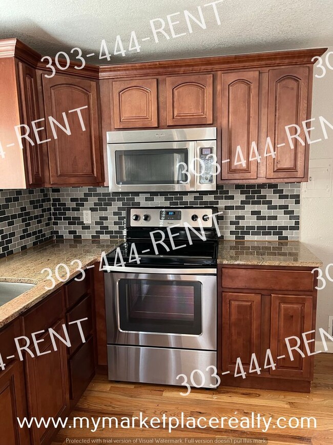 Photo - 5 Bedrooms & 2 Bathrooms walking distance to the Sheridan Light Rail Station!