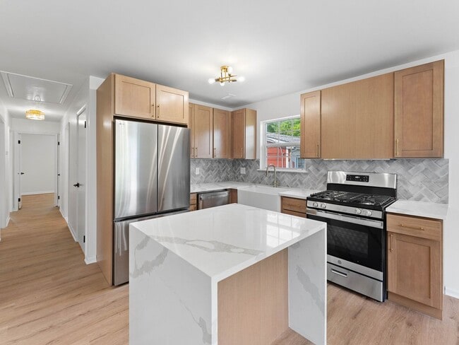 Photo - Fully Renovated 3-Bedroom Home with Designer Kitchen, Large Deck & Central Air in Pennsauken
