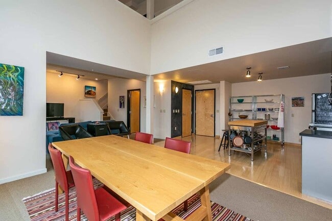 Photo - Gorgeous loft-style 2 floor condo with secured parking, A/C and rent includes most utilities! Unit 221