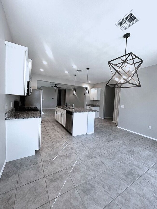 Photo - Stunning 4-bedroom, 2-bathroom home located in the vibrant community of Sahuarita, AZ