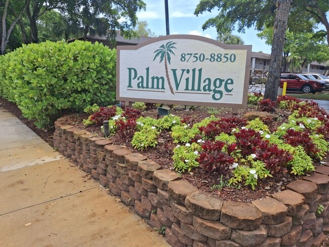 Building Photo - 8770 Royal Palm Blvd Unit 105-2
