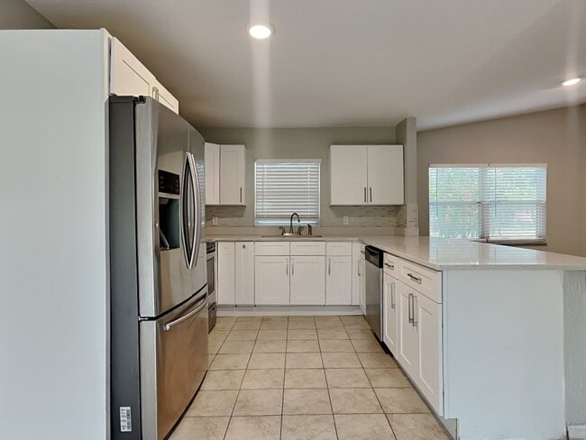 Photo - Updated 3BR/2BA Home in North Tampa – Mode...