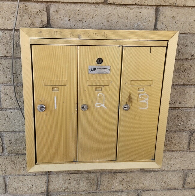 Photo - FIRST FLOOR LIVING WITH OPEN KITCHEN, DEN & CARPORT – GCU ACCESS Unit 1