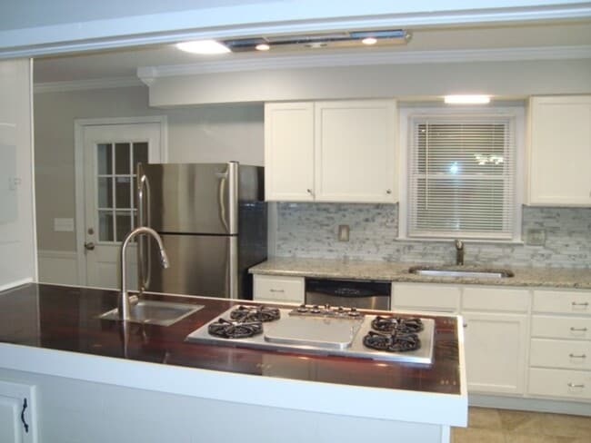 Photo - Renovated 4 bedroom available now to rent!