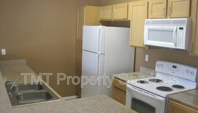 Building Photo - 4200 E Commerce Way Unit #1012