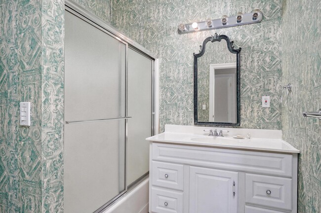 downstairs hall bath, new vanity and and mirror to be installed - 4907 S Buckingham Ln House