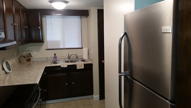 View to kitchen from DRing room - 24180 Woodridge Cir