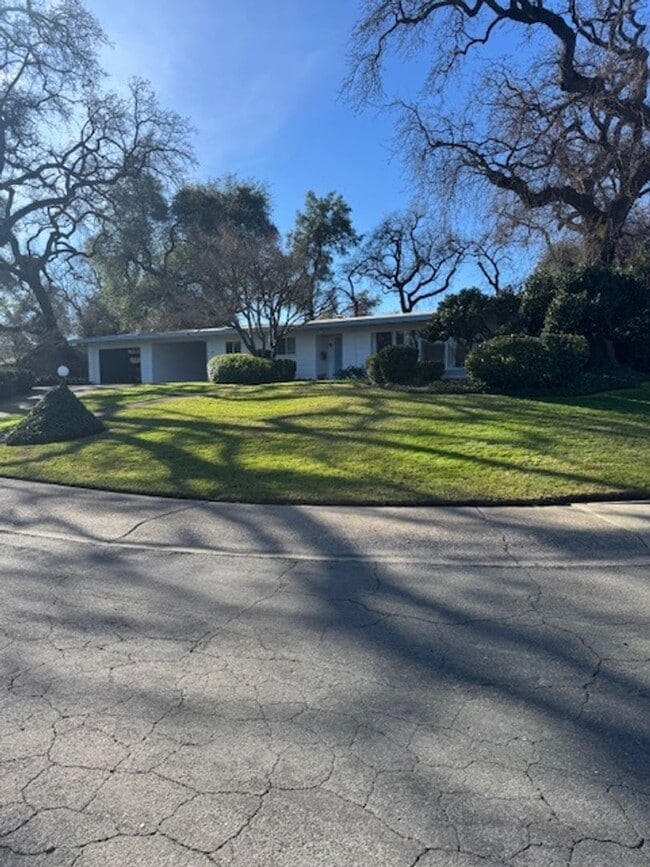 Photo - Beautifully Furnished and Recently Painted, Corner Lot Home Features a Fenced Backyard with an In...