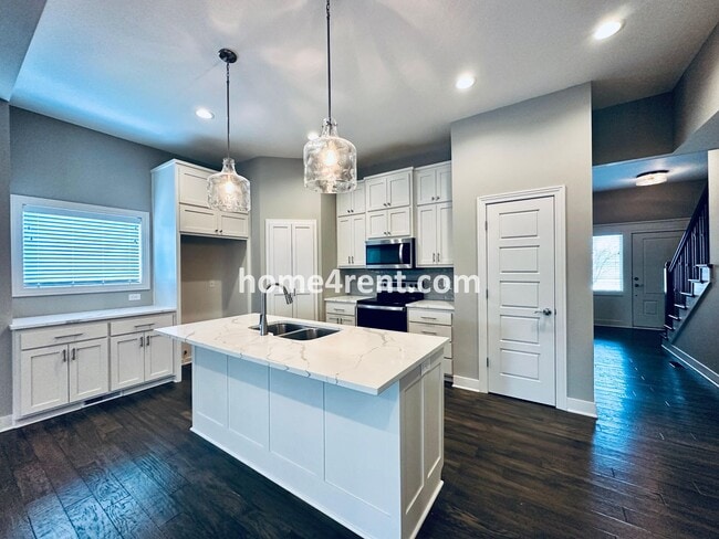 Photo - Stunning, Maintenance Free Townhome in Desoto w/ an Elegant Kitchen and Wood Floors Throughout!