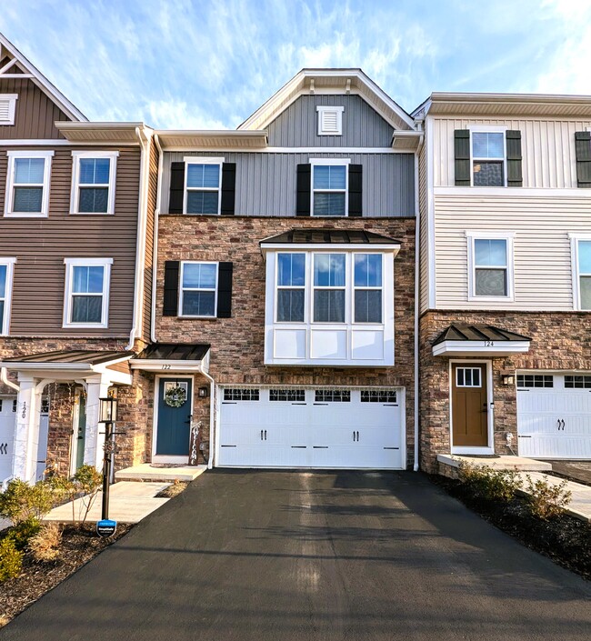 Main Front View with Bay Window - 122 Lupine Dr Townhome