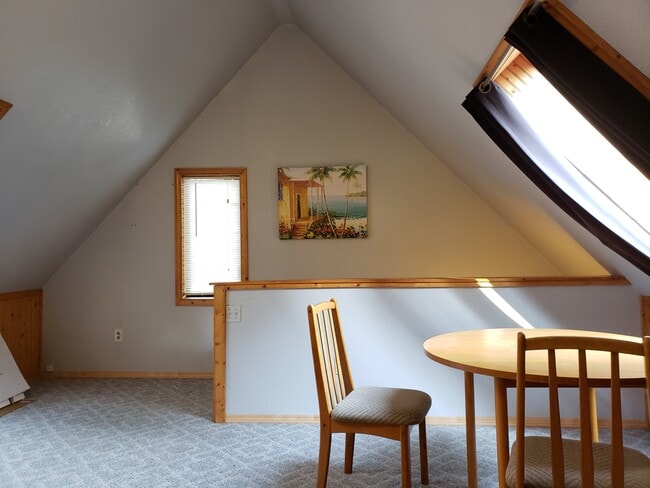 living room to stairs - 5734 Garden Lane Northwest